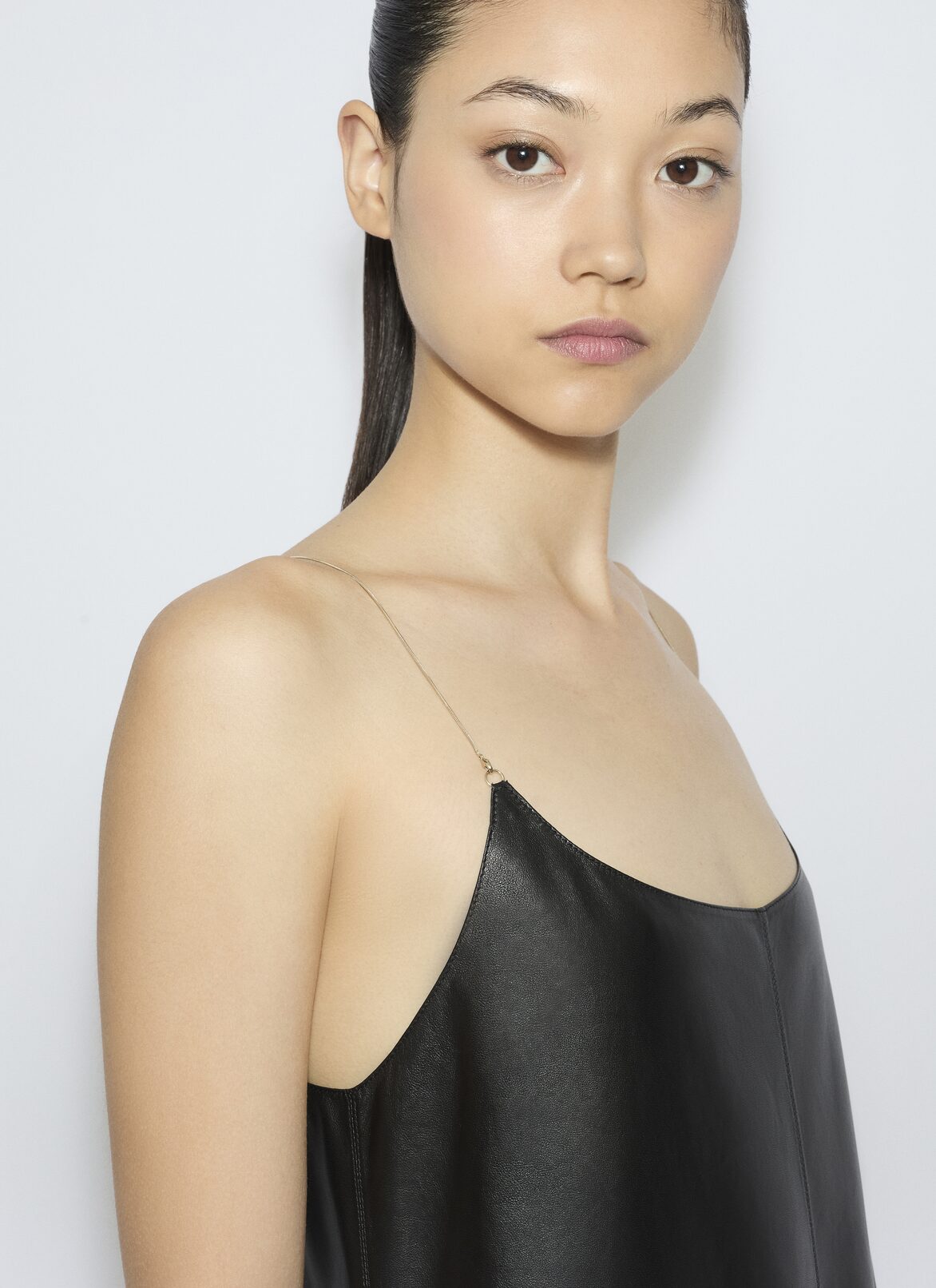 LEATHER SLIP JUMPSUIT ALAÏA BLACK LEATHER SLIP JUMPSUIT